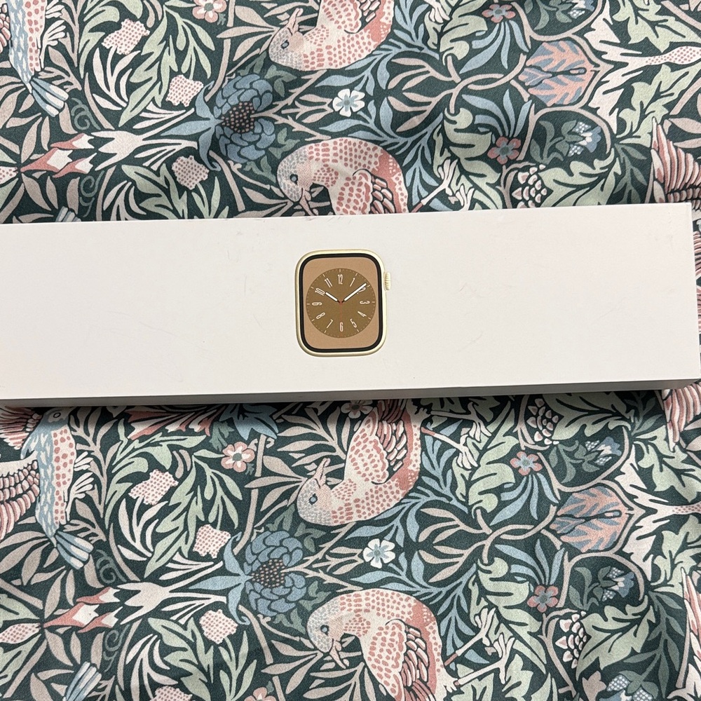 Apple Gold Smartwatch with White Band